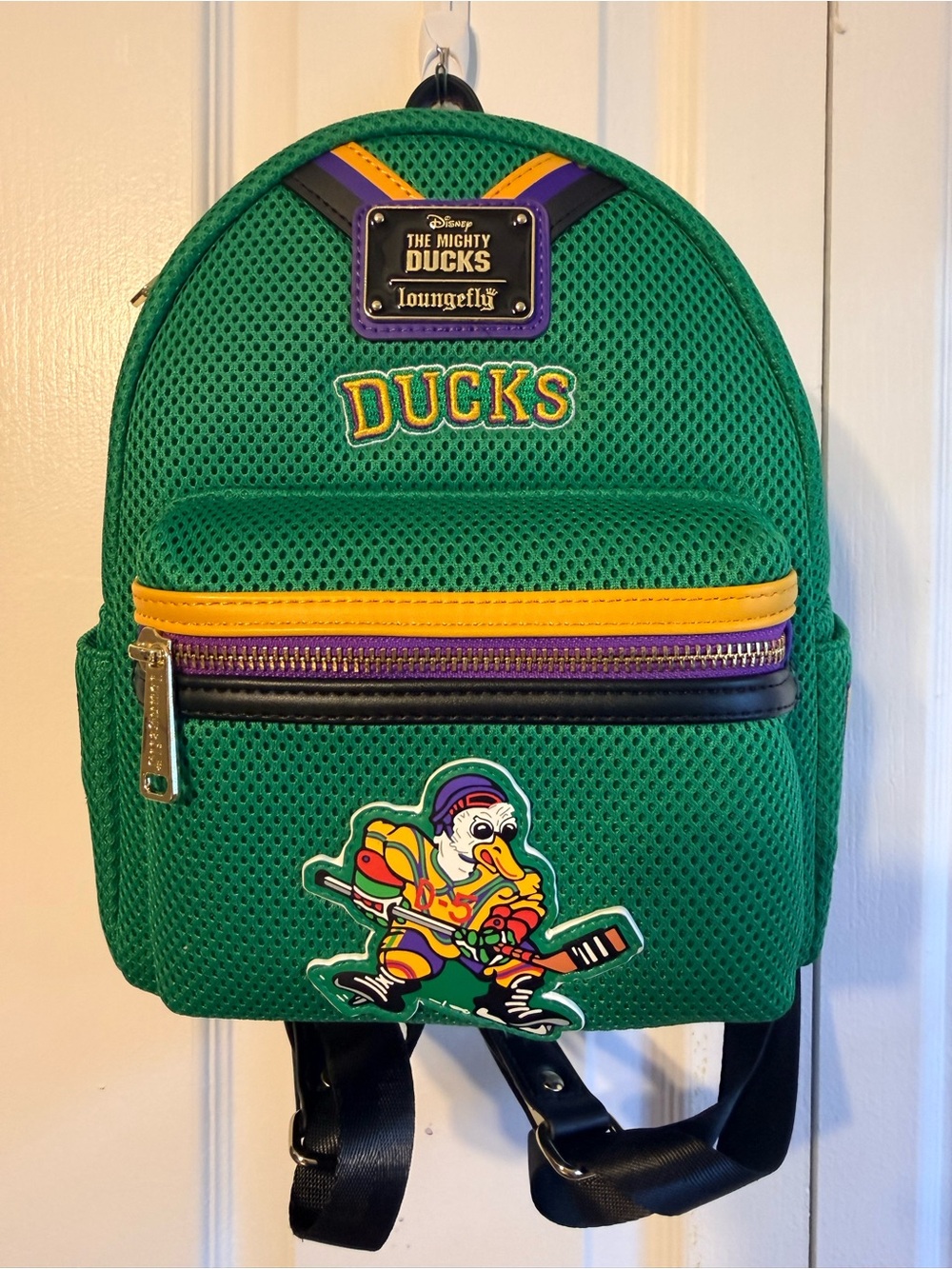 Loungefly Green Mighty Ducks Mesh Mini Backpack with Yellow & Purple Trim
